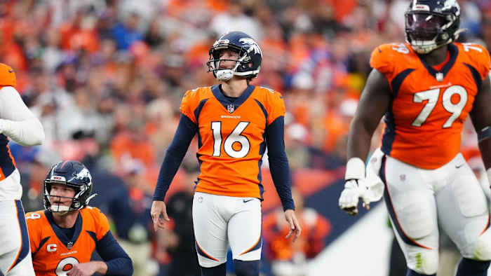 Denver Broncos place kicker Wil Lutz (16) looks on following a unsuccessful field goal attempt in the third quarter against the Las Vegas Raiders at Empower Field at Mile High.
